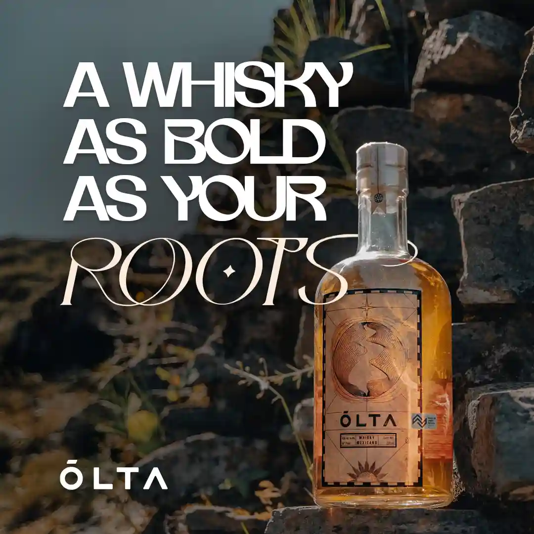 ÓLTA bottle among wild desert vegetation, teal tone